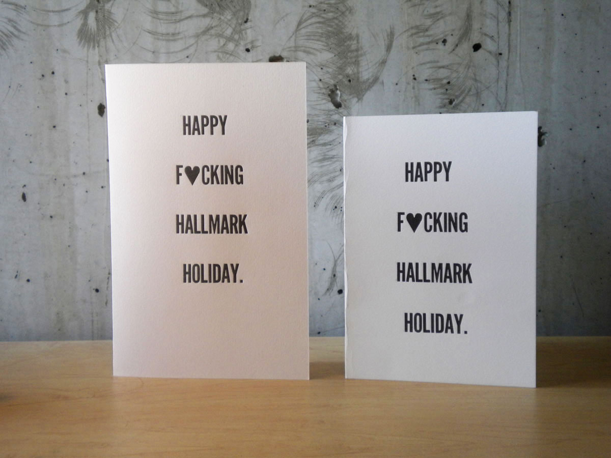 Two cards standing up with a funny phrase.