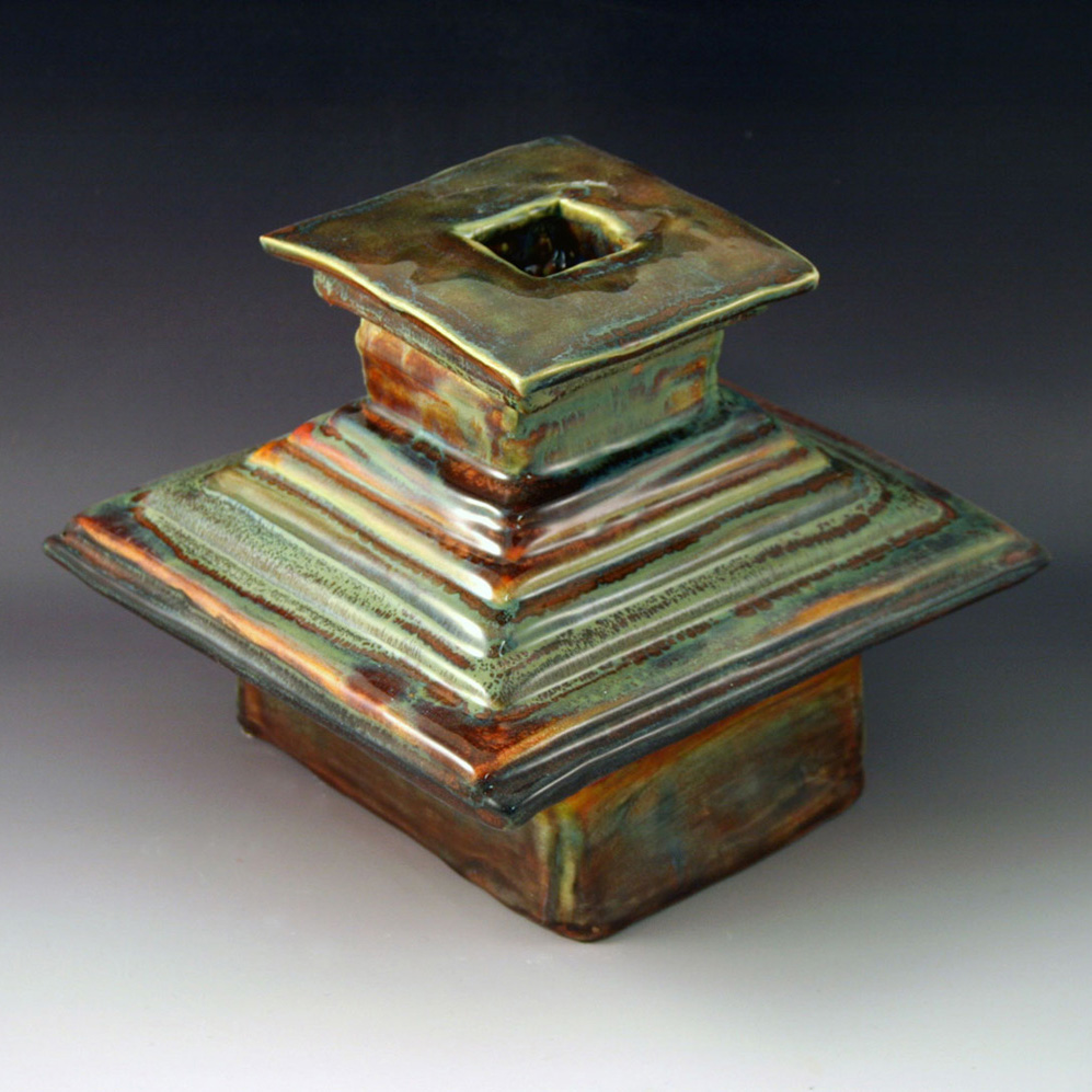 ceramic vase of stacked squares.