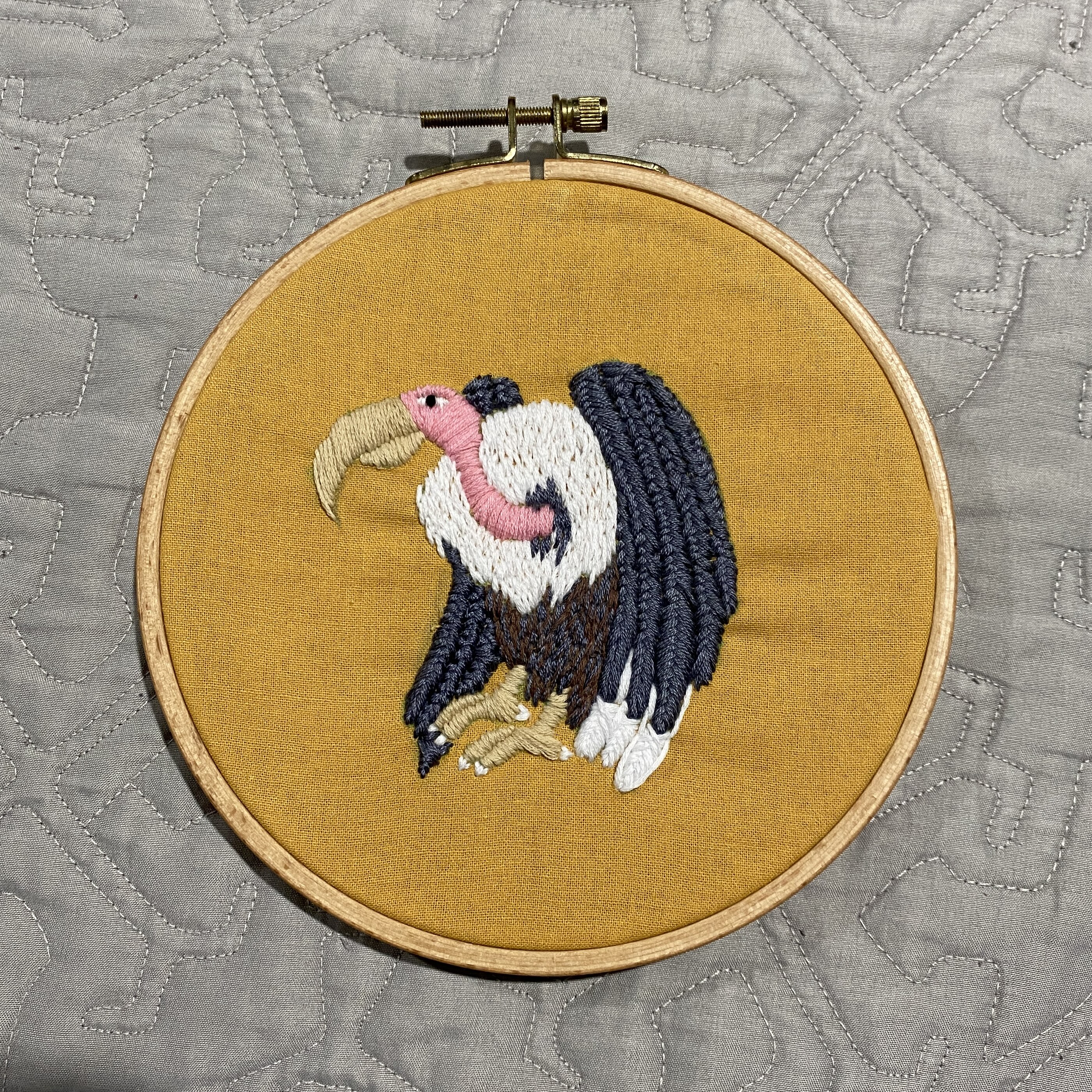 Embroidery of a vulture.